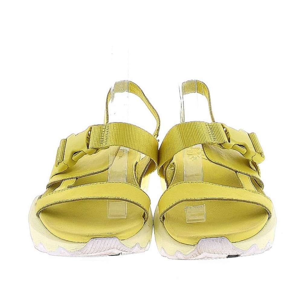 Neon yellow Sorel kinetic sandals
